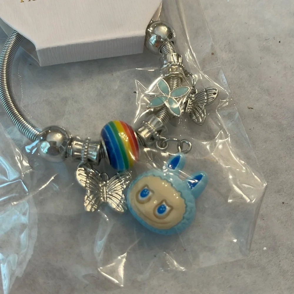 Silver Labubu Monster cartoon Charm Bracelet with blue and Rainbow Accents nwt